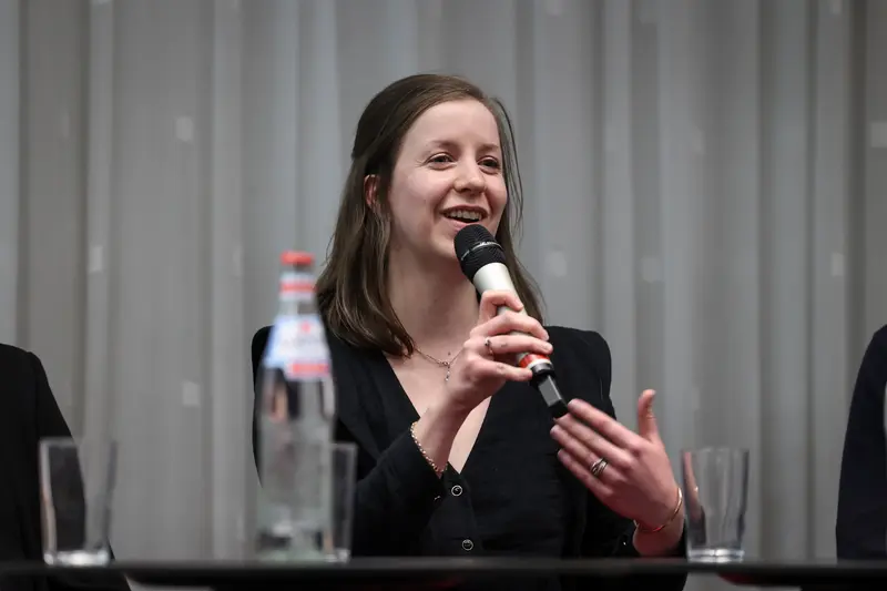 Laure Talavet-Omont speaking at a panel discussion